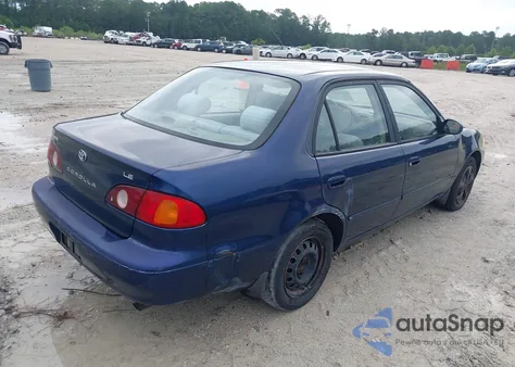 2001 Toyota Corolla Le из США, поврежденный, VIN 2T1BR12E11C511494